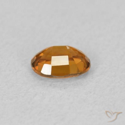 Zircon Orange feu naturelle ovale, 0.59 ct, VVS-VS