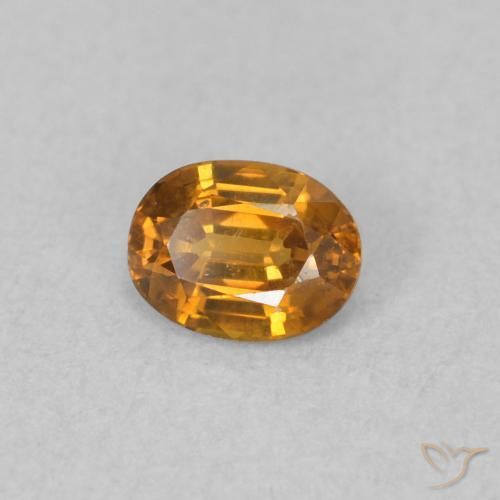 Zircon Orange brunâtre naturelle ovale, 0.58 ct, VVS-VS