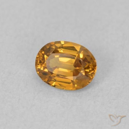 Zircon Orange rouille naturelle ovale, 0.65 ct, VVS