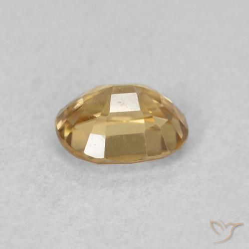 Zircon champagne naturelle ovale, 0.60 ct, VVS