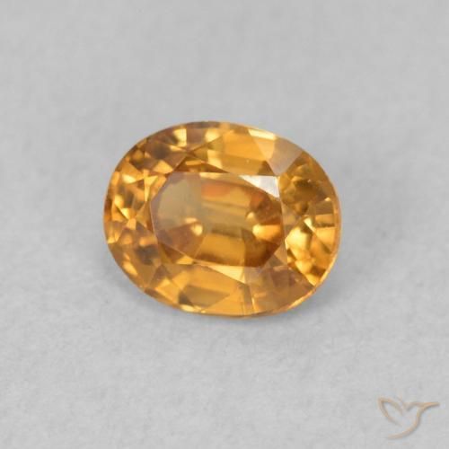 Zircon Orange foncé naturelle ovale, 0.62 ct, VVS
