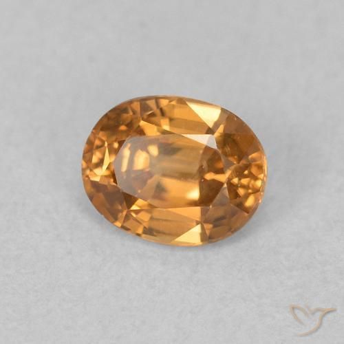 Zircon Orange moyen naturelle ovale, 0.65 ct, VVS