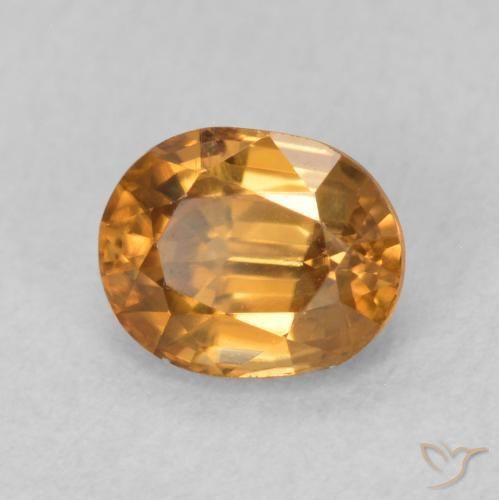 Zircon Orange brun naturelle ovale, 0.95 ct, VS