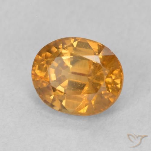 Zircon Orange brun naturelle ovale, 1.04 ct, VS