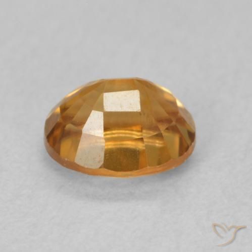 Zircon Orange brun naturelle ovale, 1.04 ct, VS