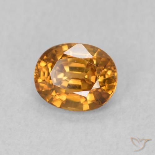 Zircon Orange brun naturelle ovale, 0.67 ct, VS