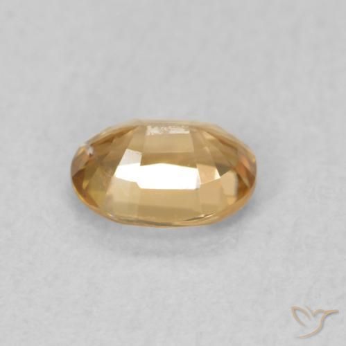 Zircon Pêche doré naturelle ovale, 0.57 ct, VS