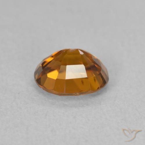 Zircon Medium Dark-Orange naturelle ovale, 0.99 ct, VVS-VS