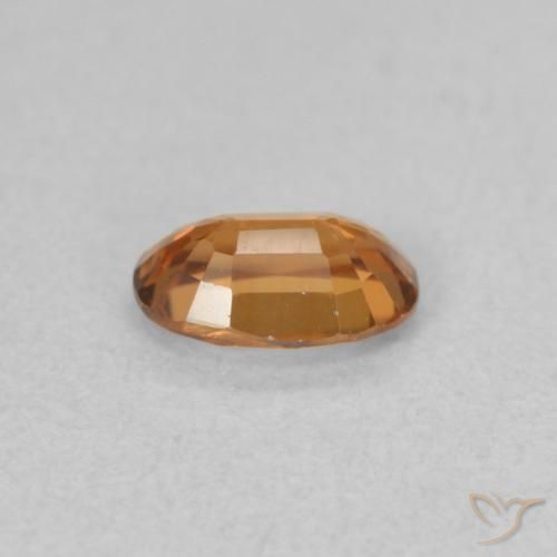 Zircon Orange brun naturelle ovale, 0.64 ct, VVS