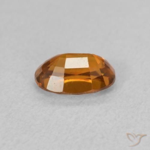 Zircon Medium Dark-Orange naturelle ovale, 0.82 ct, VVS