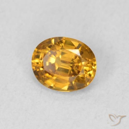 Zircon Doré foncé naturelle ovale, 0.57 ct, VVS