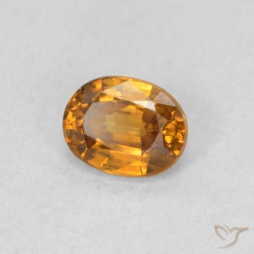 Zircon Orange terre naturelle ovale, 0.60 ct, VS