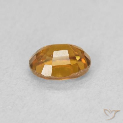 Zircon Orange terre naturelle ovale, 0.60 ct, VS