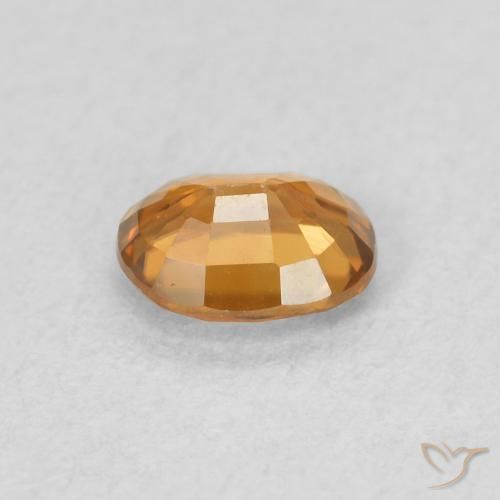 Zircon Orange moyen naturelle ovale, 0.61 ct, VVS-VS