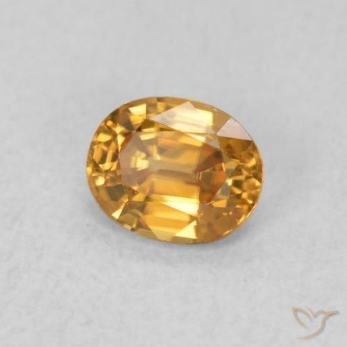 Zircon Orange moyen naturelle ovale, 0.62 ct, VVS