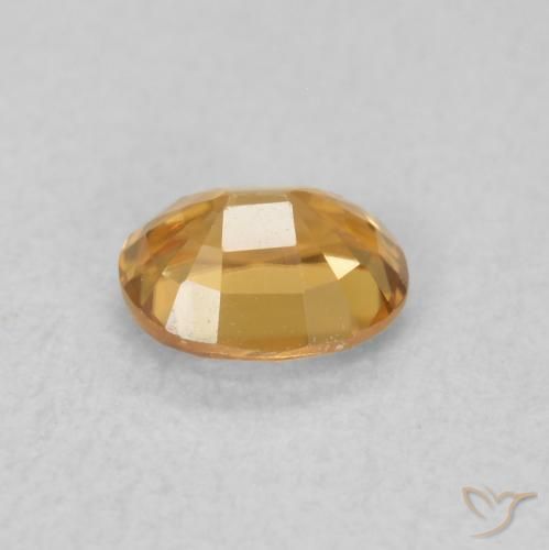 Zircon Orange moyen naturelle ovale, 0.62 ct, VVS