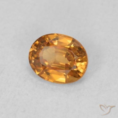 Zircon Orange moyen naturelle ovale, 0.61 ct, VVS