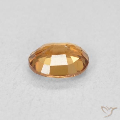 Zircon Orange moyen naturelle ovale, 0.61 ct, VVS