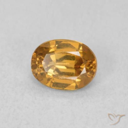 Zircon Orange moyen naturelle ovale, 0.62 ct, VVS