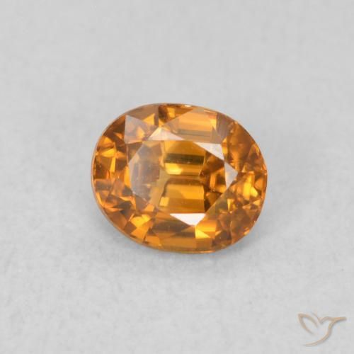 Zircon Orange moyen naturelle ovale, 0.64 ct, VVS