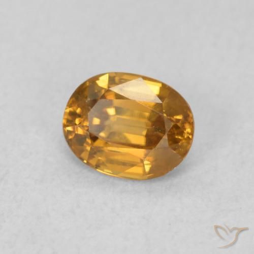 Zircon Orange brun naturelle ovale, 0.63 ct, VVS