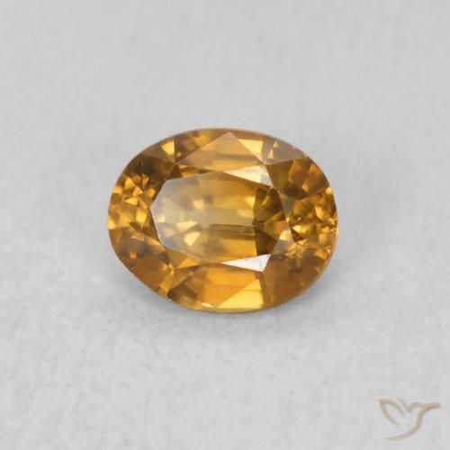 Zircon Orange brun naturelle ovale, 0.60 ct, VVS