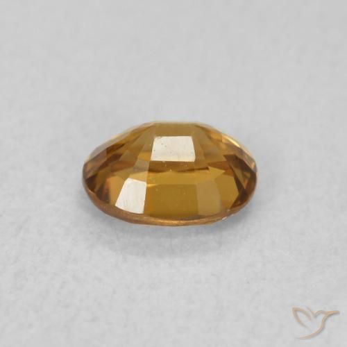 Zircon Orange brun naturelle ovale, 0.60 ct, VVS