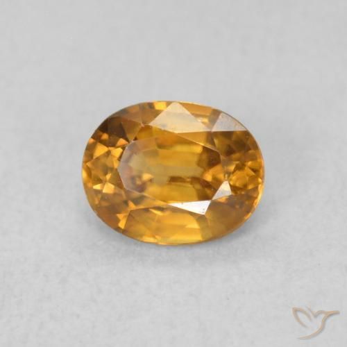 Zircon Orange brun naturelle ovale, 0.62 ct, VVS-VS