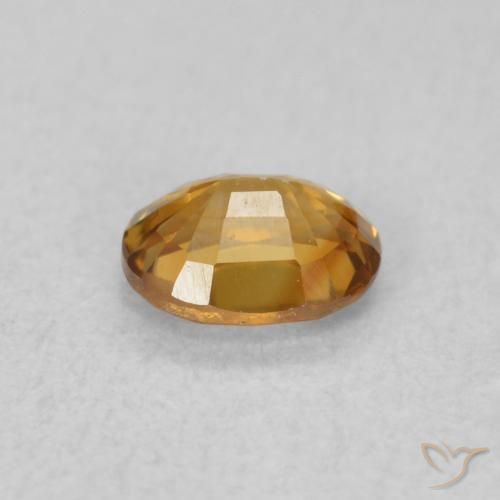 Zircon Orange brun naturelle ovale, 0.62 ct, VVS-VS