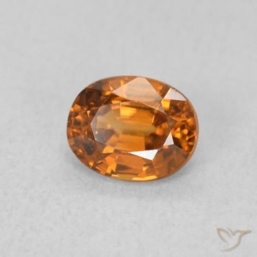 Zircon Orange foncé naturelle ovale, 0.67 ct, VVS