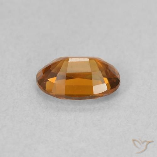 Zircon Orange moyen naturelle ovale, 0.80 ct, VVS