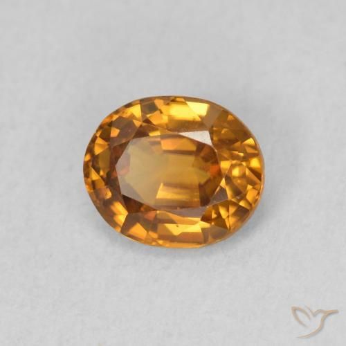 Zircon Orange brunâtre naturelle ovale, 0.94 ct, VVS