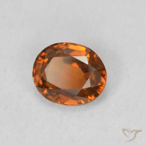 Zircon Orange foncé naturelle ovale, 0.87 ct, VVS