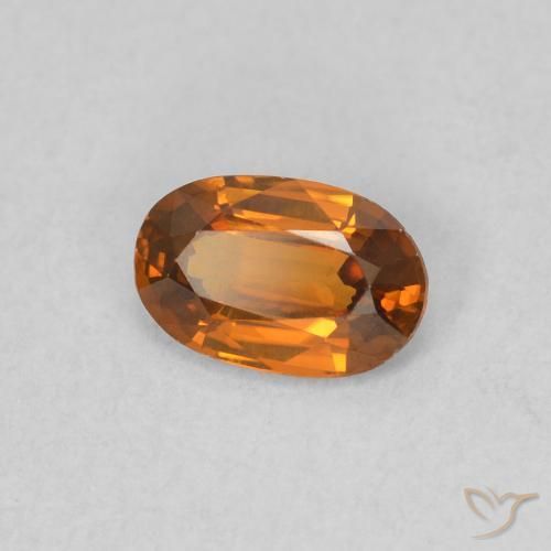 Zircon Orange moyen naturelle ovale, 0.62 ct, VVS