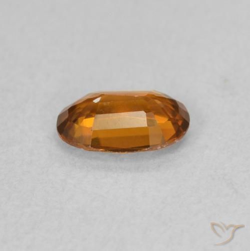 Zircon Orange moyen naturelle ovale, 0.62 ct, VVS