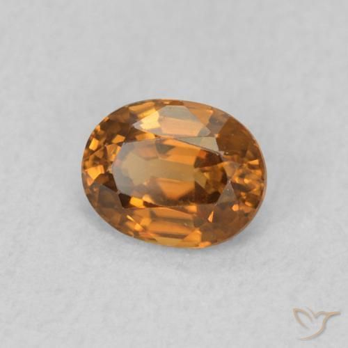 Zircon Orange brun naturelle ovale, 0.59 ct, VVS-VS