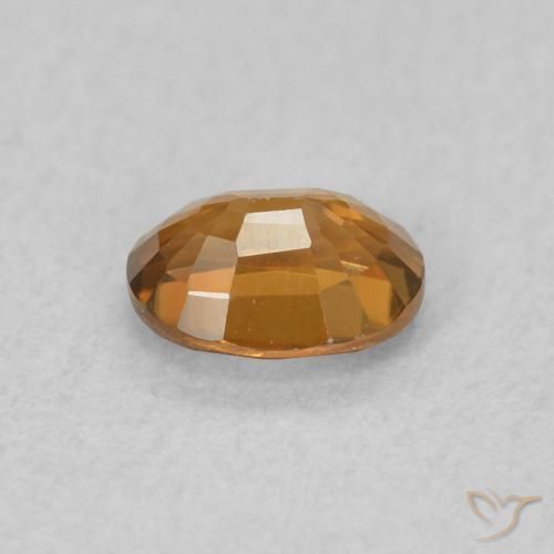 Zircon Orange brun naturelle ovale, 0.59 ct, VVS-VS