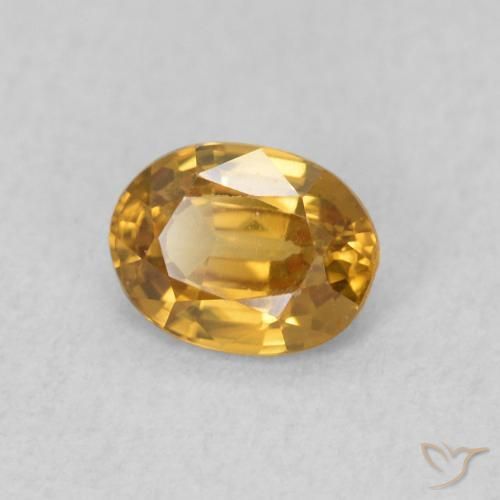 Zircon Orange doré naturelle ovale, 0.57 ct, VVS-VS