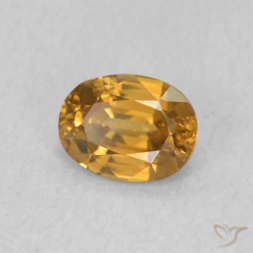 Zircon Orange doré naturelle ovale, 0.62 ct, VVS