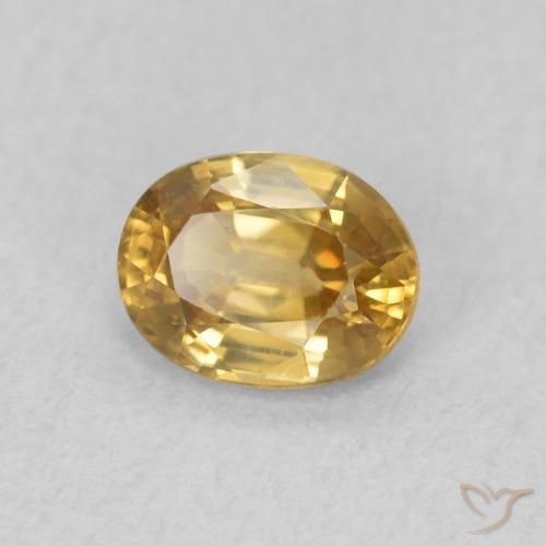 Zircon champagne naturelle ovale, 0.64 ct, VVS