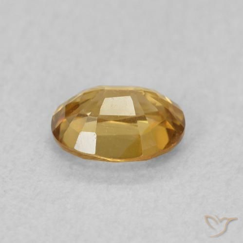 Zircon champagne naturelle ovale, 0.64 ct, VVS