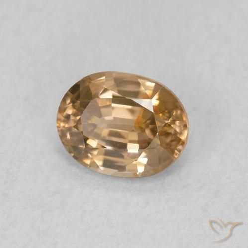 Zircon Pêche doré naturelle ovale, 0.60 ct, VVS