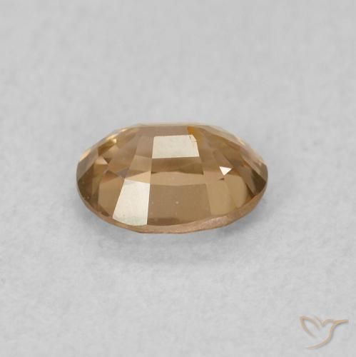 Zircon Pêche doré naturelle ovale, 0.60 ct, VVS