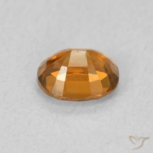 Zircon Orange moyen naturelle ovale, 0.68 ct, VVS