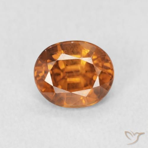Zircon Orange brun naturelle ovale, 1.02 ct, VS