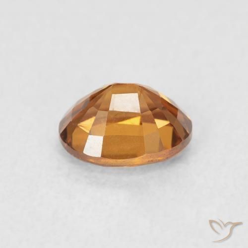 Zircon Orange brun naturelle ovale, 1.02 ct, VS