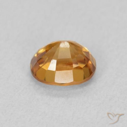 Zircon Orange terreux naturelle ovale, 1.06 ct, VVS-VS
