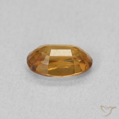Zircon Orange rouille naturelle ovale, 0.70 ct, VVS-VS