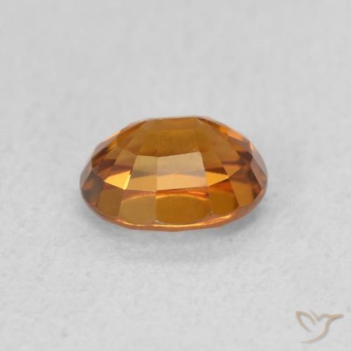 Zircon Orange terreux naturelle ovale, 0.99 ct, VVS-VS