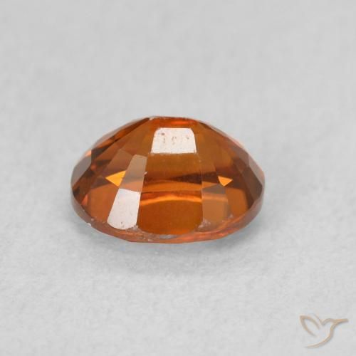 Zircon Orange rougeâtre naturelle ovale, 1.15 ct, VVS-VS